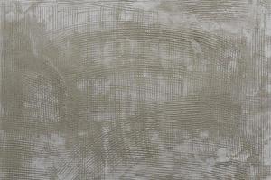 background and texture of rough cement masonry wall photo