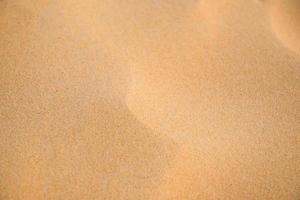 texture of  sand pattern on a beach in summer photo