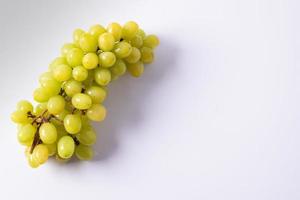 Green grapes on a white background photo