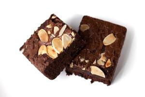 Two almonds brownies on a white background photo