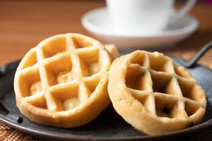 Breakfast vanilla waffles on a tray photo
