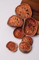 Dried quince on a white background photo