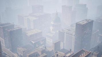 skyscrapers covered by morning fog video