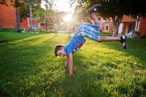 Funny boy at garden of egyptian resort. photo