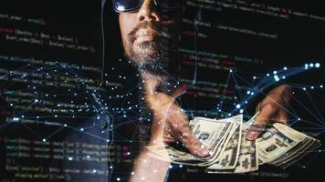 The concept of hackers and insecurity in networking. Dishonest hood man or data thieves photo
