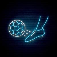 letrero de neón de fútbol. pie de un jugador de fútbol pateando la pelota. vector