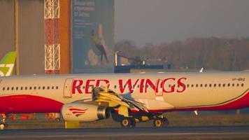 Red Wings Airlines at the airport at dawn video