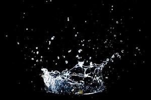 Abstract background of Water splashing on a black background. idea for freshness photo