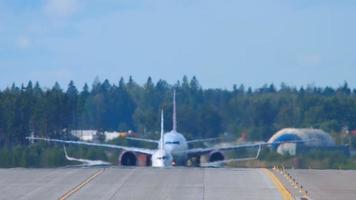 Airliners lining up on the runway for departure video