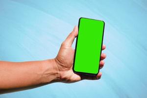 Green screen phone to put your content. photo