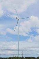 Large wind turbines provide a beautiful sky backdrop. alternative energy concept, clean energy, wind energy photo