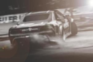 Lens blur of car racing. car race background concept photo