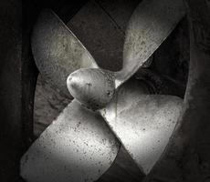 Ship propellers of a marine ship, which stands in a dry dock for repair photo