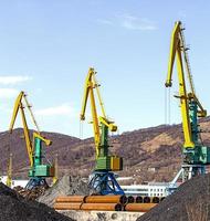 crane at the scrapyard in the seaport photo