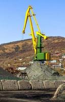 crane at the scrapyard in the seaport photo