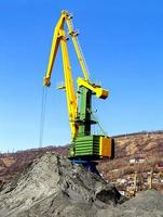 crane at the scrapyard in the seaport photo