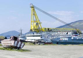 vessel with a crane at the port photo