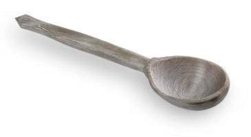 Small wooden spoon isolated on white background photo