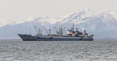 fishing trawler in the Bay on the roads photo