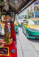 Ratchatchewi Bangkok Thailand 2018 Ride in tuk tuk during rush hour in Bangkok Thailand. photo