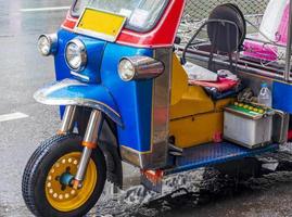 Typical colorful tuk tuk in Bangkok Thailand. photo