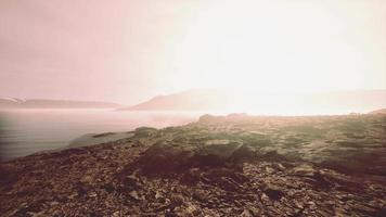 Beautiful view of foggy mountains with a reflection in a lake video