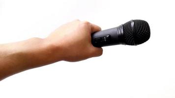 Microphone on hand isolated photo