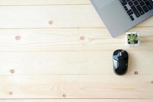 Neat workstation on a wooden desk photo