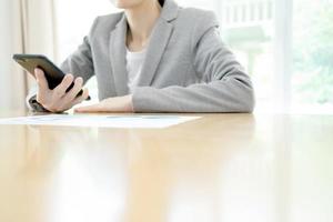 businesswoman with mobile phone photo