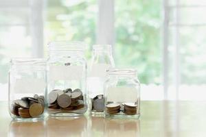 Glass jars with money coins ruble and empty sticker photo