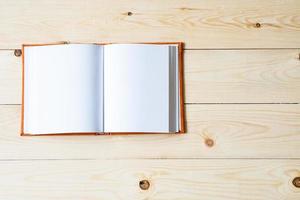 Binder notebook on wooden table photo