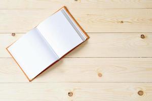 Binder notebook on wooden table photo