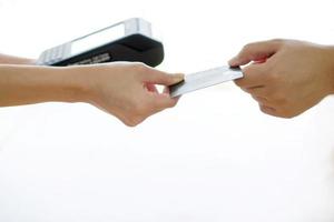 Cashier receiving credit card photo