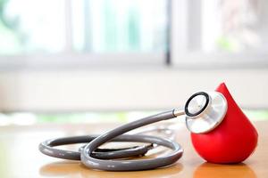 Stethoscope and red blood photo