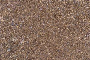 Above view of ground brown color with small stone. for background and textured. photo