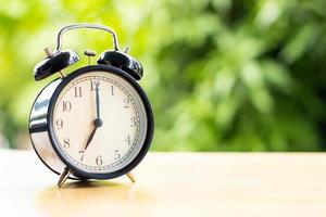 at 7 o'clock in the morning connect the time at for work with tree background copy space photo