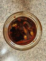 fish in spicy chili oil sauce Chinese condiment photo