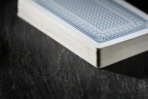 Deck of cards on wooden table. Poker cards. photo