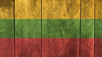 Lithuania flag. Lithuania flag on a wooden background photo