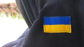 Ukraine flag on backpack photo