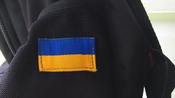 Ukraine flag on backpack photo