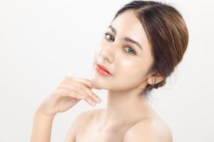 Beautiful woman model with clean fresh skin on white background, Female portrait Face care, plastic surgery Facial treatment, Cosmetology, beauty and spa. photo