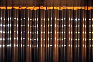 Sunlight shining through on retro door louver with carve groove photo