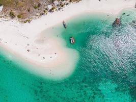 White beach with coral reef in tropical sea at Lipe island photo