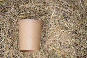 Paper cups made of natural materials, straw or wood, are biodegradable and non-polluting. help reduce global warming.eco green concept. photo