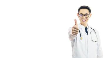 Asian good doctor man smile and thumbs up for best health and insurance package plan for advertising, over isolated white background photo