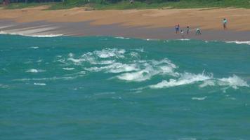 Turquoise rolling wave, slow motion video