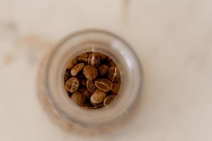 Cup of hot cappuccino coffee on table photo