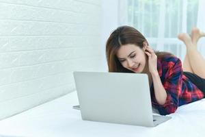 Business women sit and work at home photo