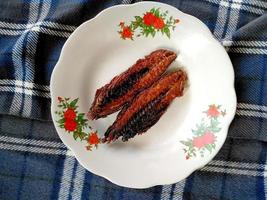 fried fish on a plate. Indonesian culinary food photo